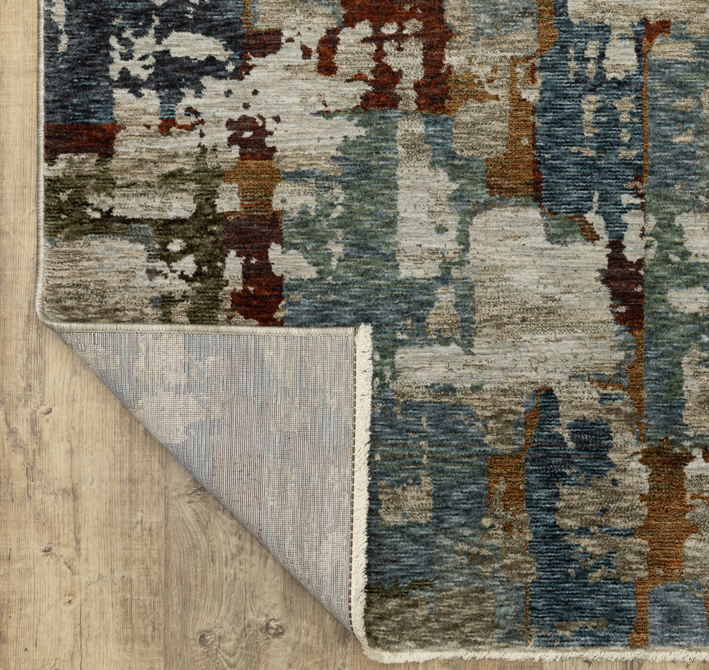 Multicolored area rug on a wooden floor