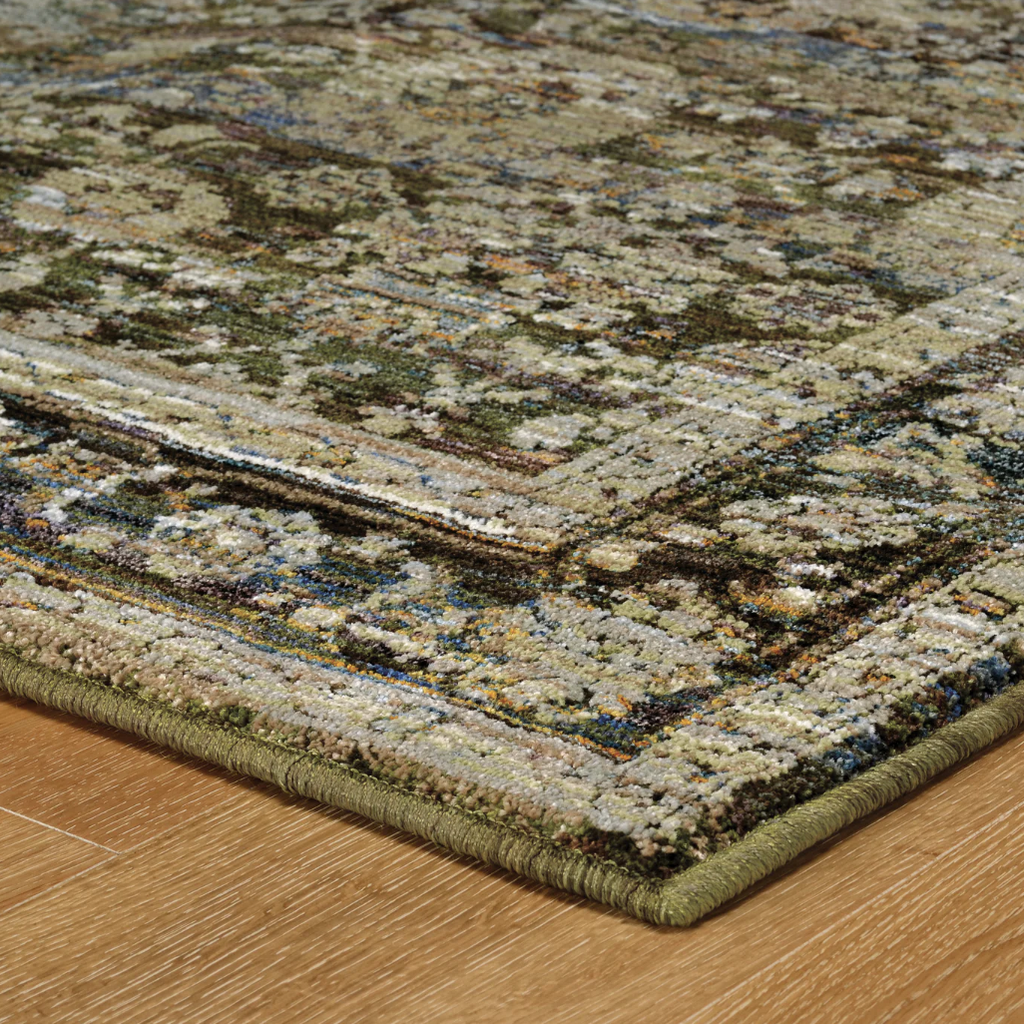 Patterned rug on a wooden floor