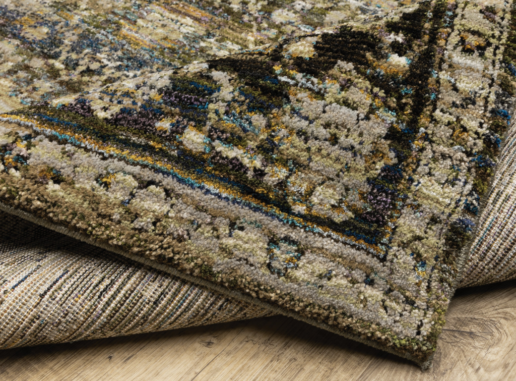 Close-up of a patterned rug on a wooden floor