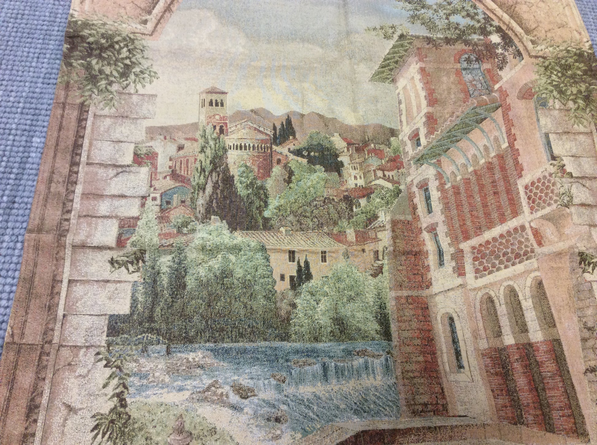 Close-up of Hillside Town Tapestry - Detailed view showcasing intricate details of the hillside town scene, including buildings and landscape.