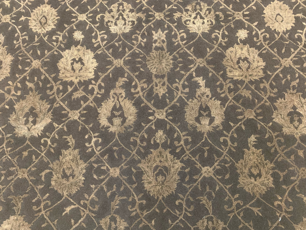close up of 7'9"x9'9" hand-tufted wool and silk rug with chocolate lattice pattern
